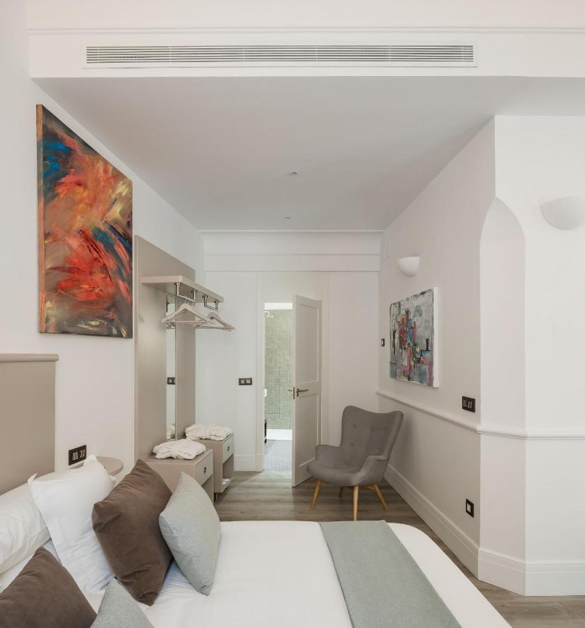 ปวยร์ตา กาเตดราล ฮอลิเดย์ สวีท Apartment เซบีญา ภายนอก รูปภาพ